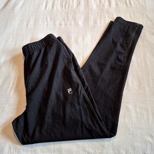 Fila Sport women's size Small black light weight side seam pockets, zipp bottom